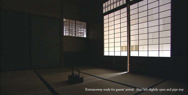 Entranceway ready for guests' arrival   Shoji left slightly open and pipe tray